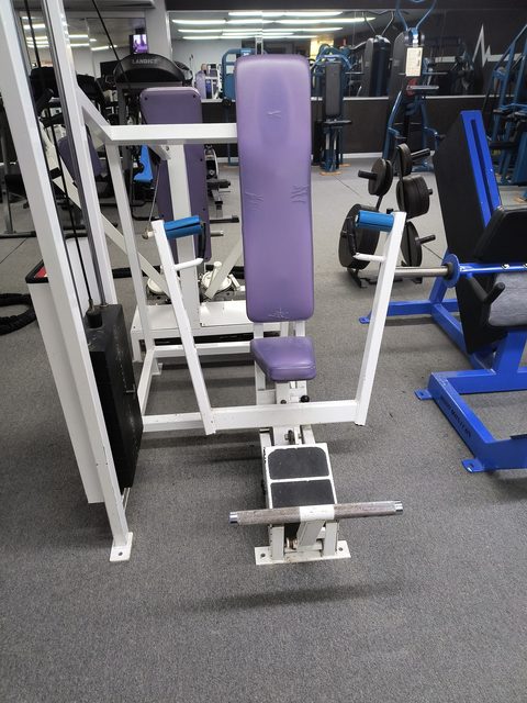 The chest press machine at the gym